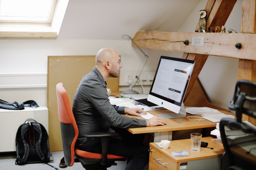 Researcher Tomáš Kroupa in his attic office.